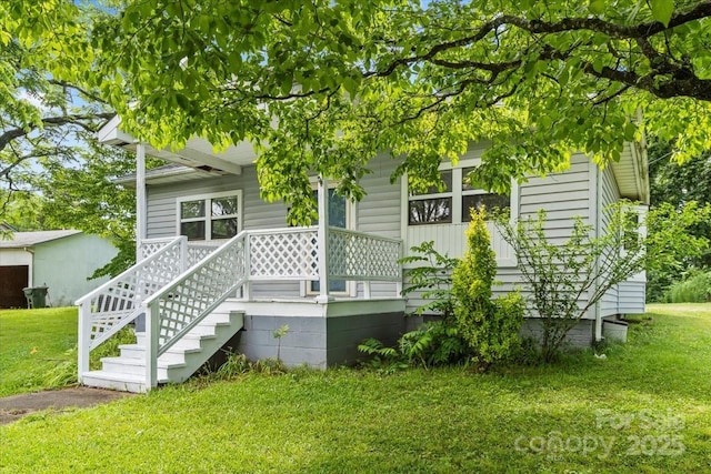 935 Church St, Kings Mountain, NC 28086 - rear view of property with a yard