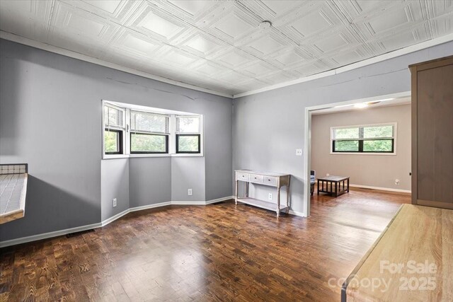 935 Church St, Kings Mountain, NC 28086 - unfurnished room featuring an ornate ceiling, wood finished floors, and baseboards