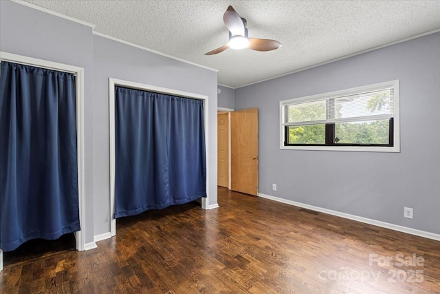 935 Church St, Kings Mountain, NC 28086 - unfurnished bedroom with crown molding, wood finished floors, a textured ceiling, ceiling fan, and baseboards