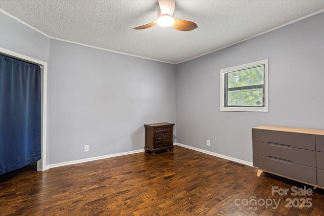 935 Church St, Kings Mountain, NC 28086 - spare room featuring crown molding, a textured ceiling, a ceiling fan, wood finished floors, and baseboards