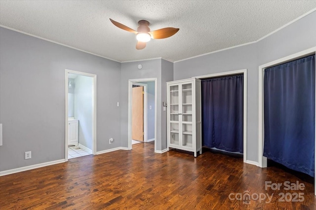 935 Church St, Kings Mountain, NC 28086 - unfurnished bedroom with a textured ceiling, ornamental molding, wood finished floors, baseboards, and a ceiling fan