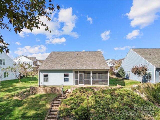 25566 Seagull Dr, Lancaster, SC 29720 - back of house featuring a sunroom, a yard, roof with shingles, and stairway