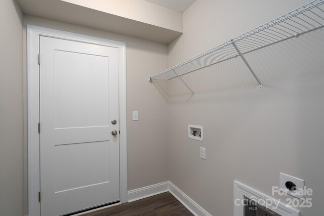 248 Pioneer Dr, Mount Gilead, NC 27306 - laundry room featuring hookup for an electric dryer, hookup for a washing machine, and dark wood-style flooring