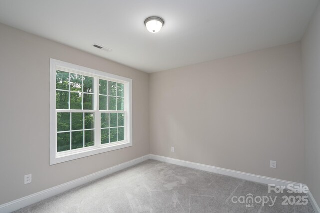 248 Pioneer Dr, Mount Gilead, NC 27306 - empty room featuring baseboards and carpet