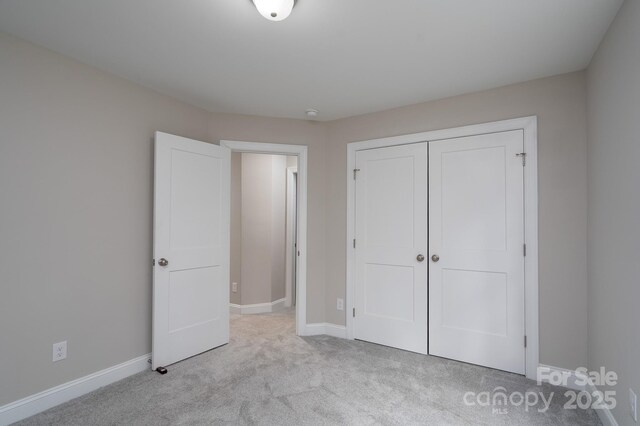 248 Pioneer Dr, Mount Gilead, NC 27306 - unfurnished bedroom featuring carpet floors and a closet