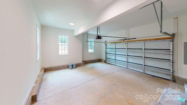 248 Pioneer Dr, Mount Gilead, NC 27306 - garage featuring a garage door opener and electric panel