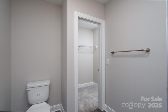 248 Pioneer Dr, Mount Gilead, NC 27306 - bathroom featuring toilet and baseboards