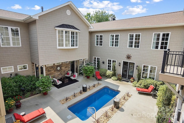 2354 Valelake Rd, York, SC 29745 - back of property with a patio, an outdoor living space, and an outdoor pool