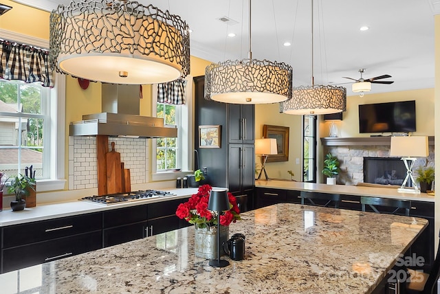 2354 Valelake Rd, York, SC 29745 - kitchen with stainless steel gas stovetop, a fireplace, healthy amount of natural light, ceiling fan, and recessed lighting