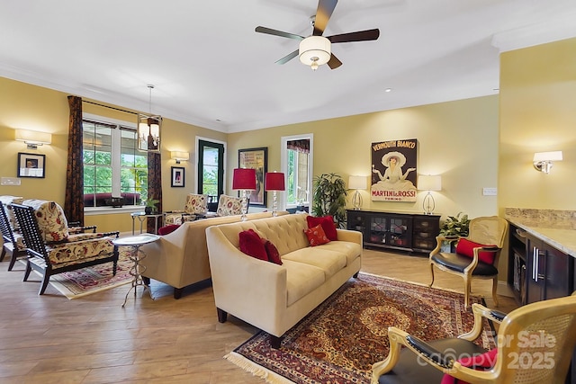 2354 Valelake Rd, York, SC 29745 - living room featuring healthy amount of natural light, a ceiling fan, light wood-style floors, and ornamental molding