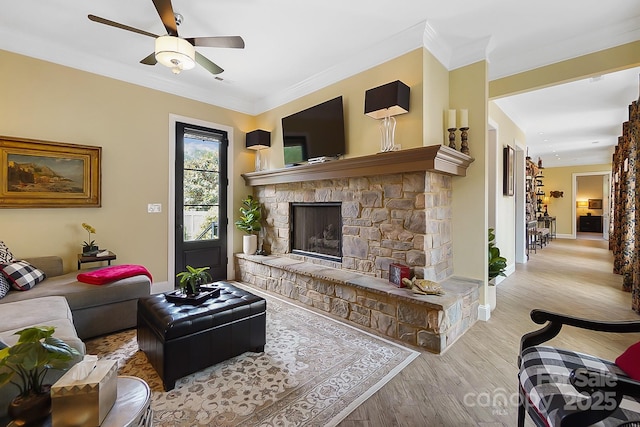 2354 Valelake Rd, York, SC 29745 - living area with wood finished floors, ornamental molding, a ceiling fan, a fireplace, and baseboards