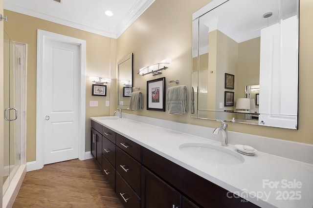 2354 Valelake Rd, York, SC 29745 - full bathroom featuring double vanity, ornamental molding, wood finished floors, a stall shower, and baseboards