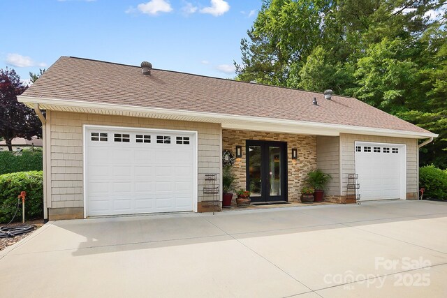 2354 Valelake Rd, York, SC 29745 - view of front facade with concrete driveway, roof with shingles, an attached garage, and french doors