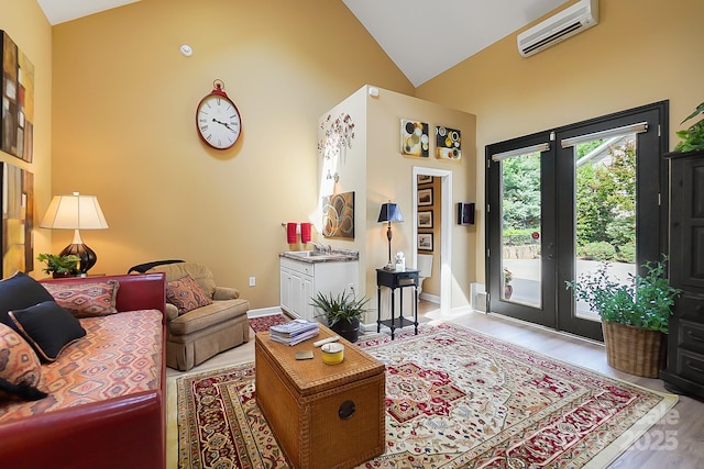 2354 Valelake Rd, York, SC 29745 - living room featuring a wall mounted AC, high vaulted ceiling, wood finished floors, french doors, and baseboards