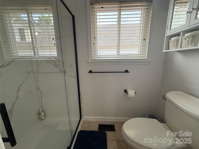 18 Olde Duffers Dr, Nebo, NC 28761 - full bath with a marble finish shower, toilet, and healthy amount of natural light