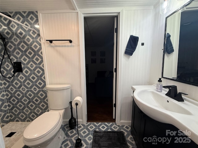 18 Olde Duffers Dr, Nebo, NC 28761 - full bath featuring vanity, a tile shower, toilet, and tile patterned flooring