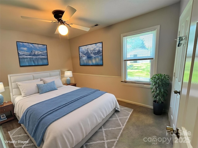 2316 Woodfield Cir, Gastonia, NC 28056 - bedroom with baseboards, carpet floors, and a ceiling fan