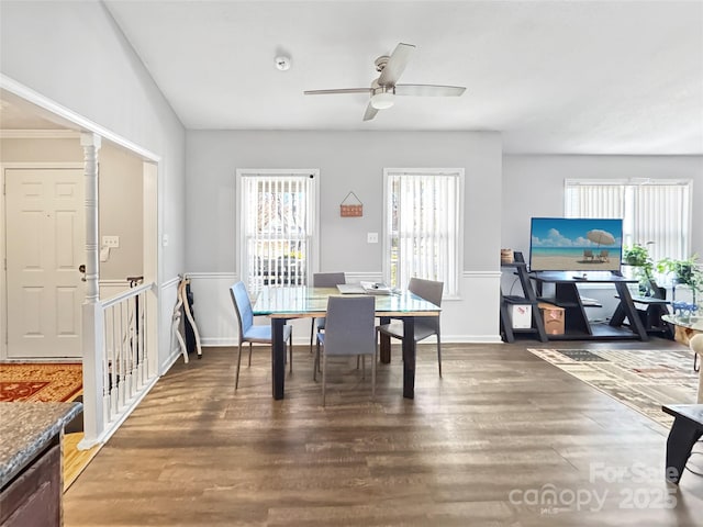 2316 Woodfield Cir, Gastonia, NC 28056 - dining room featuring plenty of natural light, a ceiling fan, wood finished floors, and baseboards