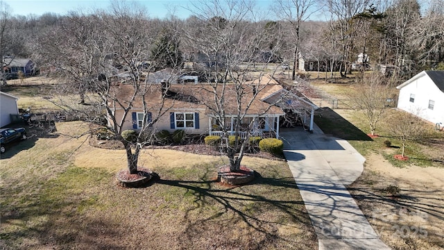 2316 Woodfield Cir, Gastonia, NC 28056 - view of front facade featuring concrete driveway and a front yard