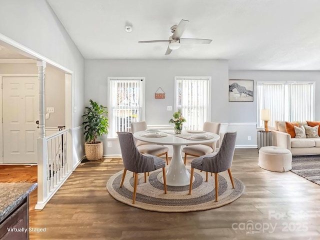 2316 Woodfield Cir, Gastonia, NC 28056 - dining room with light wood-style floors, ceiling fan, and baseboards