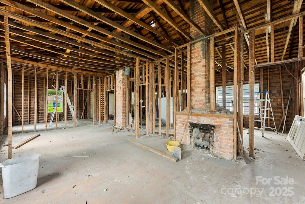 92 E Spencer Mountain Ave, Gastonia, NC 28054 - misc room with water heater and an outdoor brick fireplace