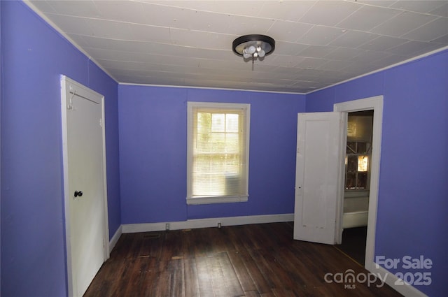 1216 Mountain Ave, Gastonia, NC 28052 - unfurnished bedroom with hardwood / wood-style floors, crown molding, and baseboards