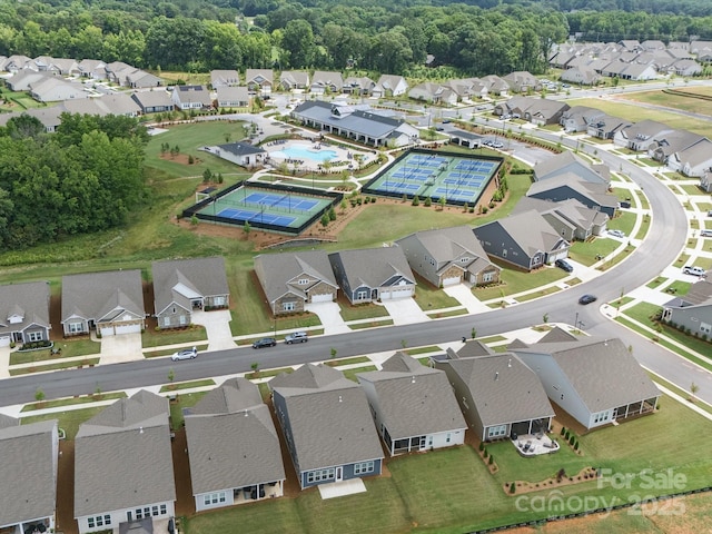 6015 Waldorf Ave, Monroe, NC 28110 - aerial view of property and surrounding area featuring nearby suburban area and a pool