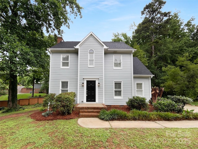 124 Creek Hollow Trl, Belmont, NC 28012 - view of front of home featuring a chimney and a shingled roof