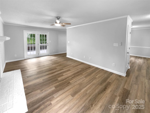 124 Creek Hollow Trl, Belmont, NC 28012 - unfurnished living room featuring ceiling fan, crown molding, baseboards, wood finished floors, and a brick fireplace