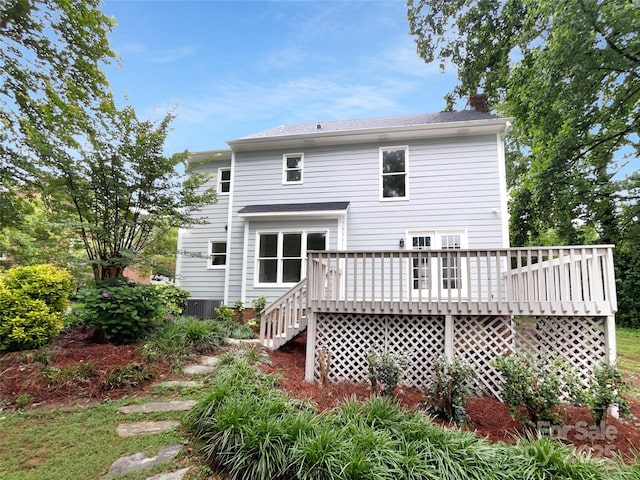 124 Creek Hollow Trl, Belmont, NC 28012 - back of property with a wooden deck, stairway, a chimney, and cooling unit