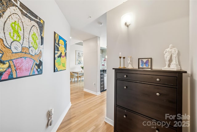 210 N Church St Unit 2807, Charlotte, NC 28202 - hallway featuring light wood-type flooring and baseboards