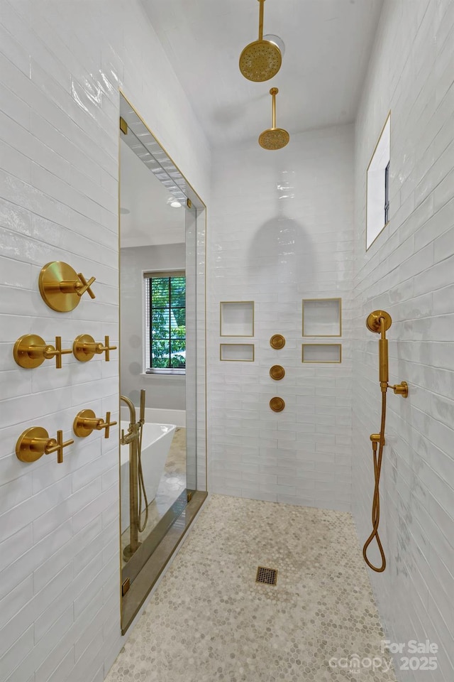 4211 Tangle Dr, Charlotte, NC 28211 - bathroom featuring a freestanding bath and a tile shower
