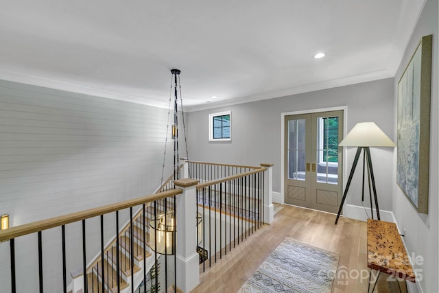 4211 Tangle Dr, Charlotte, NC 28211 - hall with an upstairs landing, wood finished floors, ornamental molding, baseboards, and recessed lighting