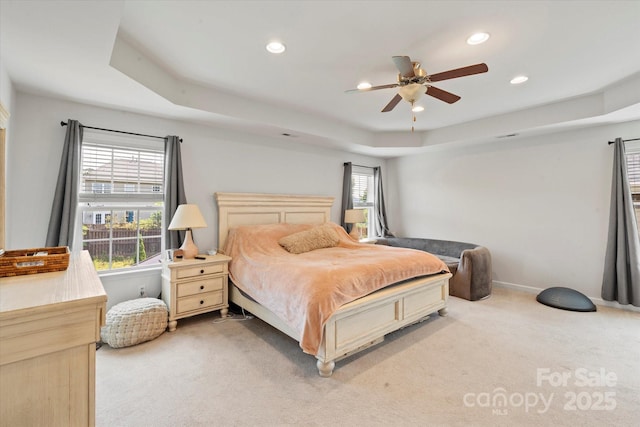 197 Roanoke Rd, Fletcher, NC 28732 - bedroom featuring light carpet, recessed lighting, a tray ceiling, and ceiling fan