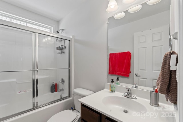 197 Roanoke Rd, Fletcher, NC 28732 - bathroom with vanity, enclosed tub / shower combo, and toilet