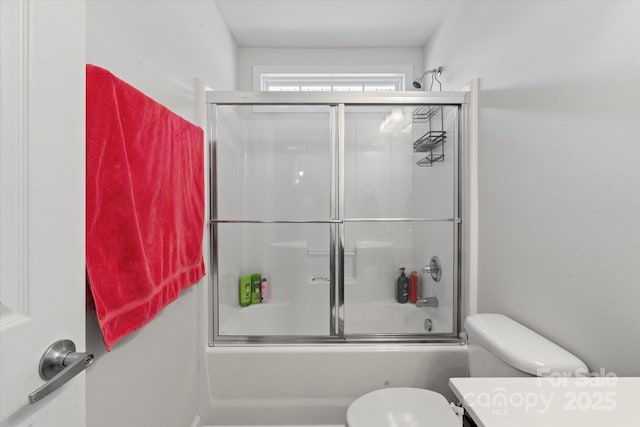 197 Roanoke Rd, Fletcher, NC 28732 - full bathroom featuring toilet, bath / shower combo with glass door, and vanity