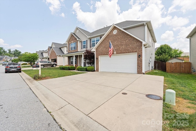 197 Roanoke Rd, Fletcher, NC 28732 - traditional-style house featuring brick siding, concrete driveway, and a garage