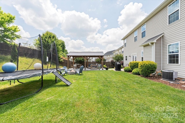 197 Roanoke Rd, Fletcher, NC 28732 - view of yard featuring a gazebo, central AC unit, an outdoor fire pit, and a patio