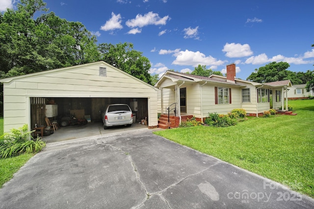 2084 Old Evans Cir, Lancaster, SC 29720 - single story home with a chimney, a detached garage, and a front lawn