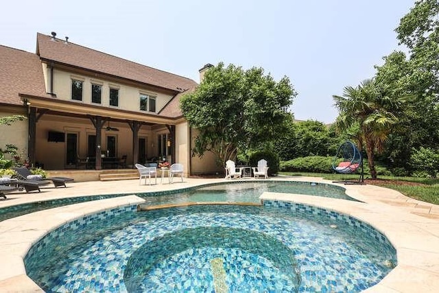 1103 Mapesbury Ln, Waxhaw, NC 28173 - view of swimming pool featuring a ceiling fan, a patio, and a pool with connected hot tub
