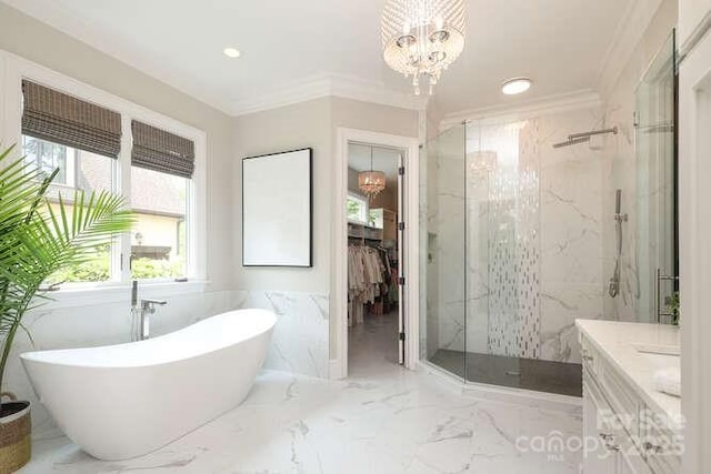1103 Mapesbury Ln, Waxhaw, NC 28173 - full bathroom featuring a chandelier, a marble finish shower, plenty of natural light, a freestanding bath, and crown molding