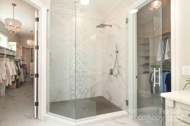 1103 Mapesbury Ln, Waxhaw, NC 28173 - bathroom with marble tiled flooring, a marble finish shower, and a walk in closet