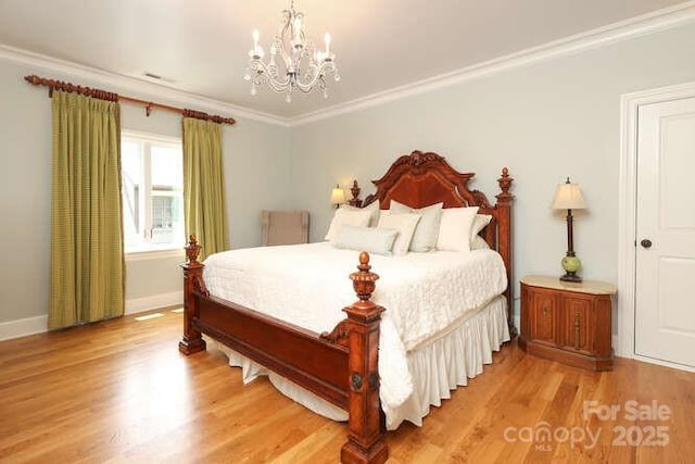 1103 Mapesbury Ln, Waxhaw, NC 28173 - bedroom featuring a chandelier, ornamental molding, light wood-style floors, and baseboards
