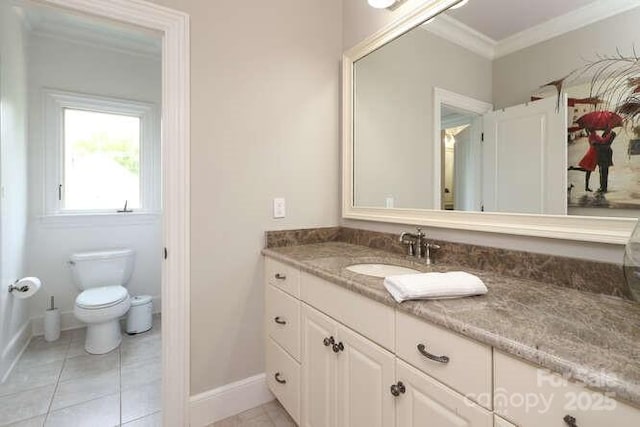 1103 Mapesbury Ln, Waxhaw, NC 28173 - bathroom featuring vanity, ornamental molding, toilet, baseboards, and tile patterned floors