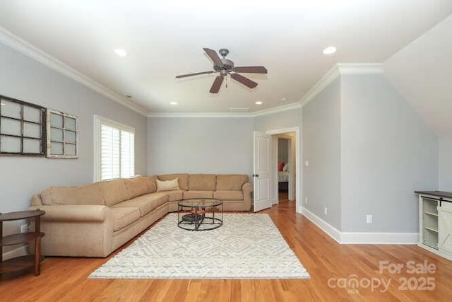 1103 Mapesbury Ln, Waxhaw, NC 28173 - living room with a ceiling fan, light wood-type flooring, recessed lighting, baseboards, and crown molding