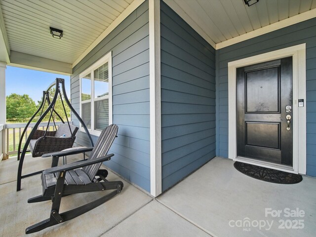 11225 Island View Ln, Lancaster, SC 29720 - view of exterior entry featuring covered porch