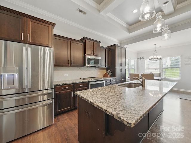 11225 Island View Ln, Lancaster, SC 29720 - kitchen featuring appliances with stainless steel finishes, a sink, light stone countertops, a kitchen island with sink, and tasteful backsplash