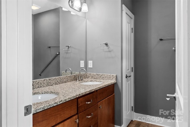 6 Meeting St, Asheville, NC 28803 - bathroom featuring double vanity and baseboards