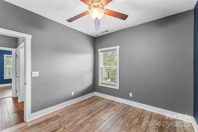 6 Meeting St, Asheville, NC 28803 - unfurnished room featuring wood finished floors, baseboards, and ceiling fan