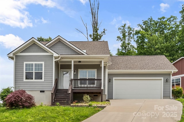 6 Meeting St, Asheville, NC 28803 - view of front of home featuring a porch, driveway, a garage, and a shingled roof
